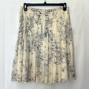 Theory cream and black silk skirt with pleats and floral pattern